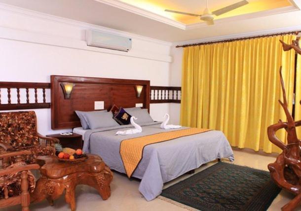 Rangerwood Nature Castle Kumarakom Rom bilde
